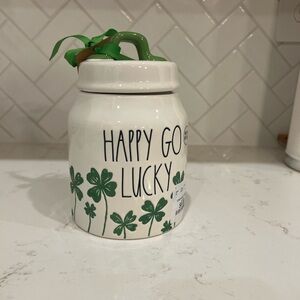 Rae Dunn Happy Go Lucky Canister